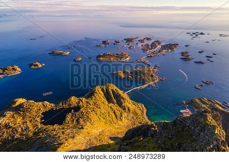 Top Of Mount Festvagtinden With Views Over The Village Of Henningsvaer. Henningsvaer Is A Fishing Vi