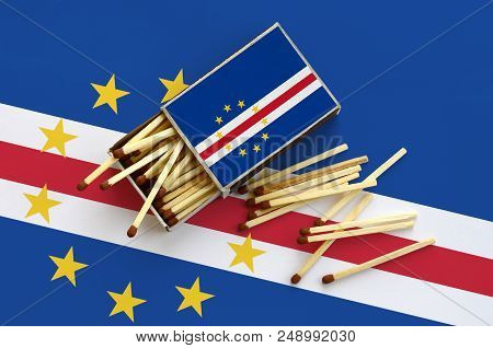 Cabo Verde Flag  Is Shown On An Open Matchbox, From Which Several Matches Fall And Lies On A Large F