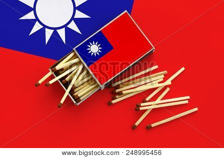 Taiwan Flag  Is Shown On An Open Matchbox, From Which Several Matches Fall And Lies On A Large Flag.