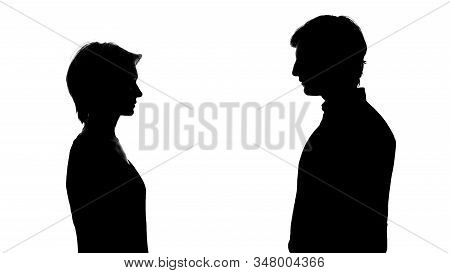 Silhouette Of Man And Woman Stand Opposite, Equal Rights, Social Advertisement