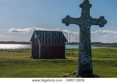 Old Stone Cross Nearsaint Birgittas Chapel Ruin On A Sunny Spring Day. Kapelludden On Oland, Sweden.