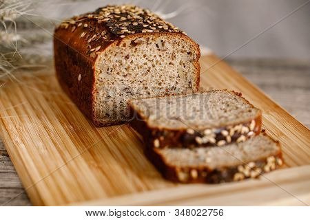 Whole Wheat Gluten Free Bread With Flax Seads Sunflower Chia Seads Sesame. Side View With Copy Space