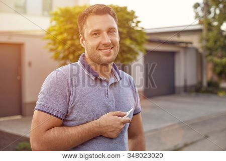Electronic Cigarettes, Cigarette Technology. Tobacco Iqos System. Close-up Of A Man Smoking An Elect