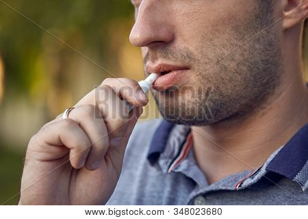 Electronic Cigarettes, Cigarette Technology. Tobacco Iqos System. Close-up Of A Man Smoking An Elect