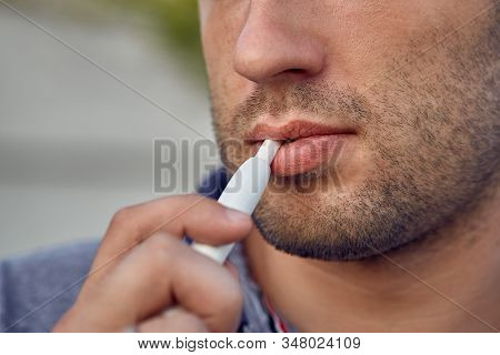 Electronic Cigarettes, Cigarette Technology. Tobacco Iqos System. Close-up Of A Man Smoking An Elect