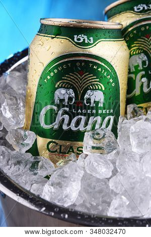 Two Cans Of Chang Beer In Bucket With Crushed Ice