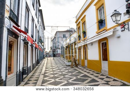 Ponta Delgada, Azores, Portugal - Jan 12, 2020: Empty Street With Bars And Restaurants In The Histor
