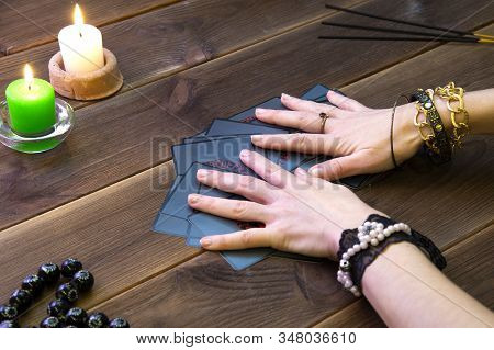 Minsk Belarus 2019 December 07. Fortune Telling Cards, Runic Cards For Fortune Telling On A Wooden T