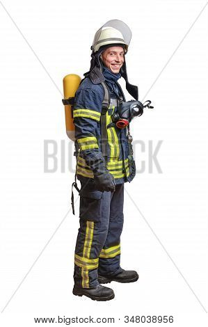Young Fireman With A Mask And An Air Breathing Apparatus On His Back In A Fully Protective Suit Isol
