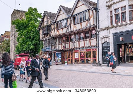 Oxford, Great Britain - May 21, 2014: Cornmarket Street Is The Main Street In The Pedestrian Area Of