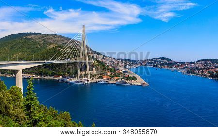 Dubrovnik, Croatia - July 8, 2019: The Franjo Tudjman Bridge And Blue Lagoon With Harbor Of Dubrovni