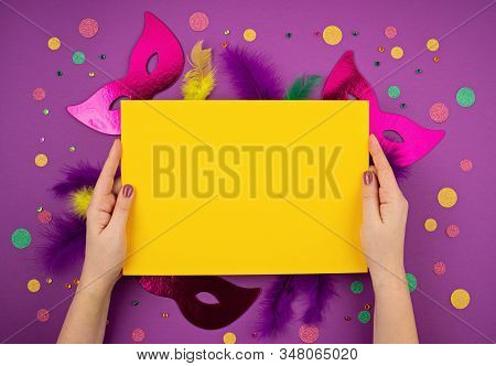 Festive, Colorful Mardi Gras Or Carnivale Mask And Accessories Over Purple Background. Party Invitat
