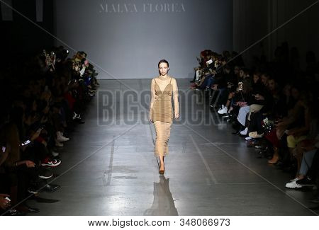 Kyiv, Ukraine - February 5, 2019: Model Presents A Creation By Designer Malva-florea During 44th Ukr
