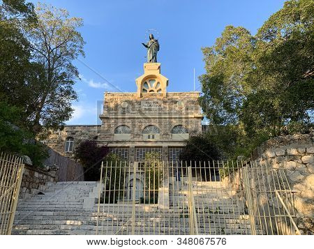 Deir Rafat, Israel - January 11, 2020: Statue Of Virgin Mary On The Front Of The Monastery Of Deir R