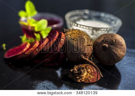 Beetroot Face Mask On The Black Glossy Surface Consisting Of Some Grated Beetroot Vegetable And Sour