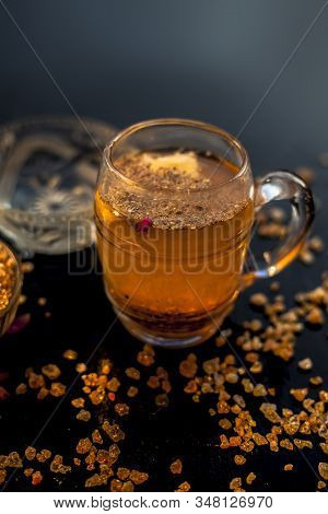 Special Gond Katria Summer Drink In A Glass Mug On Wooden Surface With Some Black Pepper And Lemon J