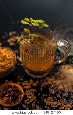 Special Gond Katria Summer Drink In A Glass Mug On Wooden Surface With Some Black Pepper And Lemon J