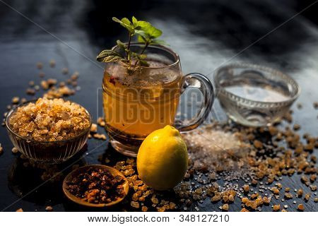Special Gond Katria Summer Drink In A Glass Mug On Wooden Surface With Some Black Pepper And Lemon J