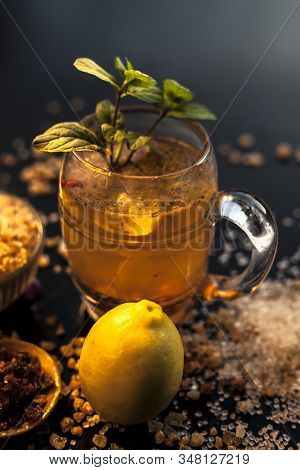 Special Gond Katria Summer Drink In A Glass Mug On Wooden Surface With Some Black Pepper And Lemon J