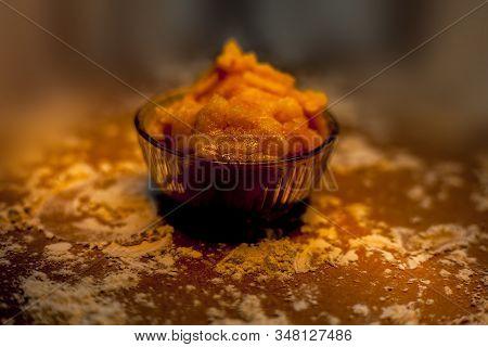 Well, The Lighted Upshot Of Jaggery Or Confectionery Sugar In A Glass Bowl Also Known As Gud In Asia