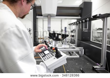 Quality Engineer Measuring Some Moldings By Professional 3d Measuring System Machine, Industrial Con