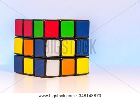 Karlsruhe, Germany On December 8, 2017: Magic Cube For Problem Solving On Light Blue Background