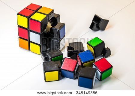 Karlsruhe, Germany On December 8, 2017: Pieces Of Rubiks Cube For Problem Solving On White Backgroun