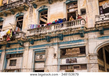 Havana, Cuba On December 23, 2015: Next To The Capitolio Lies Centro Habana, Where There Are Few Tou