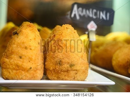 Tasty Italian Street Food, Deep Fried Aranchini Rice Balls With Different Filling Close Up