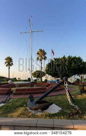 Turkey, Hatay - August 24, 2019: The Monument With Anchor In Iskenderun With Trees