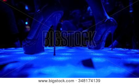 Close-up View Of High Heels, Professional Go-go Dancer Performing At Nightclub