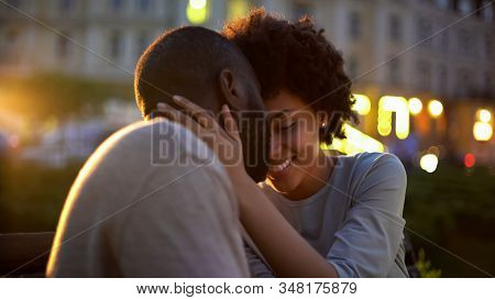 Petty Woman Tenderly Stroking Boyfriends Face, Love Expression, Nuzzling On Date