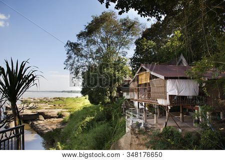 Old Wooden Hut Of Monk Or Parsonage On Cliff Riverside Mekong River At Wat Hin Maak Peng In Nongkhai