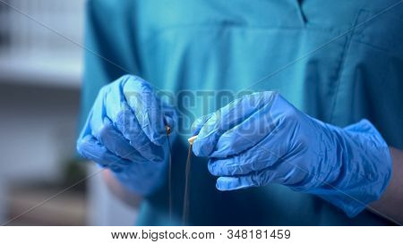 Doctor Pouring Powder From Opened Pill, Counterfeit Medication Distribution