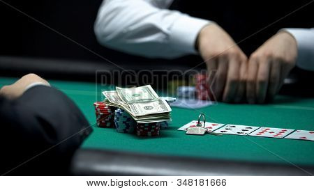 Addicted Gambler Poker Player Going All-in, Betting Chips, Money And House Keys