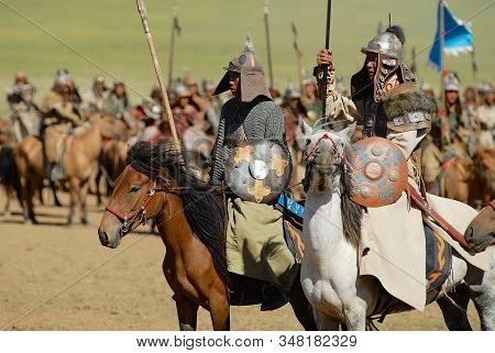 Ulaanbaatar, Mongolia - August 17, 2006: Mongolian Horse Riders Take Part In The Traditional Outdoor