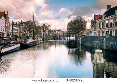 Photo Of The Historic Delfshaven With Beautiful Colored Clouds In Rotterdam, And Is The Birthplace O