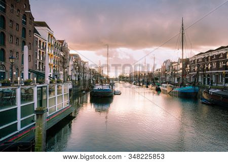 Photo Of The Historic Delfshaven With Beautiful Colored Clouds In Rotterdam, And Is The Birthplace O