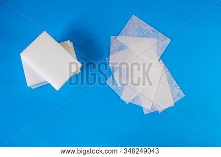 White Napkins Top View. A Set Of Cosmetic Tools For Manicure And Pedicure