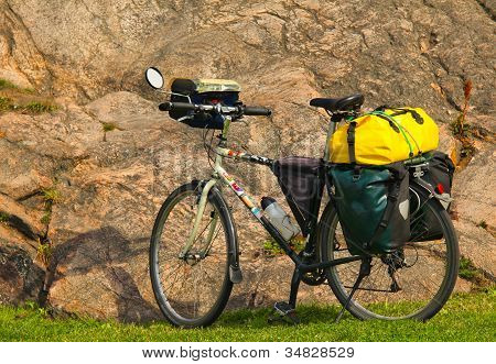 Loaded Touring Bicycle On Rest Break, Next To A Mauntain
