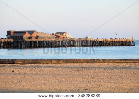 January 25, 2020 In Santa Barbara, Ca:  Long Rustic Wooden Pier With Seafood Restaurants And Retail 