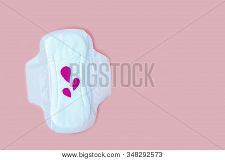 Protective Menstrual Pad With Fabric Blood Drops On Pink Background. The Concept Of Women Gynecologi