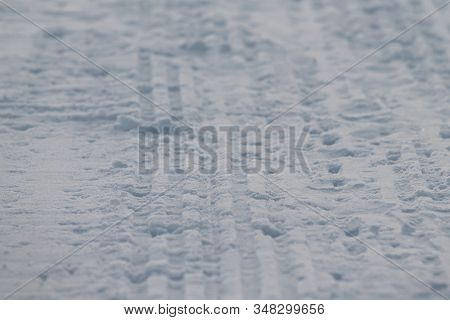 Rribbed Footprint In Snow Left Snowcat. Preparation Of Ski Slopes. The Concept Of Snow Removal, Ski 