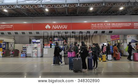 Osaka, Japan- 03 Dec, 2019: Traveler With Luggage At Kansai Airport Station In Osaka Japan. A Railwa