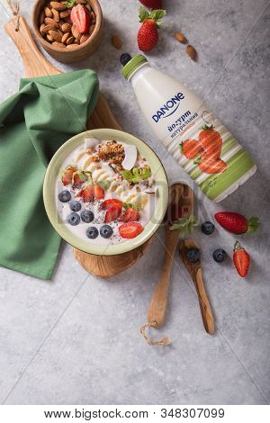 Kyiv, Ukraine - Jenuary 05, 2020: Danone Yogurt Botl. Smoothie Probiotic Or Smoothy Bowl With Granol