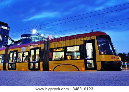 Warsaw,poland. 22 February 2016. Rondo Daszynskiego. Buildings, Tram And Cars.