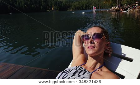Woman Shooting Self Portrait. Take Photo And Video On Smartphone. Girl Rest, Relax, Walk In Sunglass
