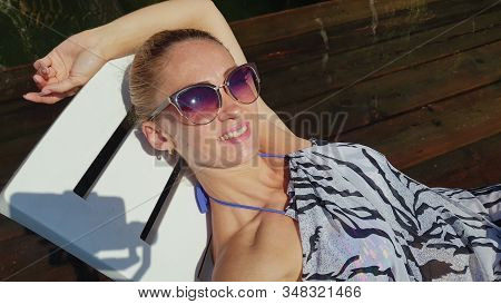 Woman Shooting Self Portrait. Take Photo And Video On Smartphone. Girl Rest, Relax, Walk In Sunglass