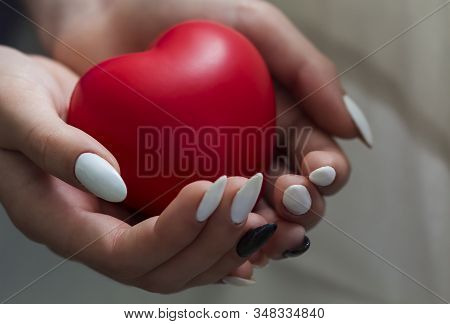 Girl Hands Holding Red Heart, Health Care, Donate And Family Insurance Concept,world Heart Day, Worl