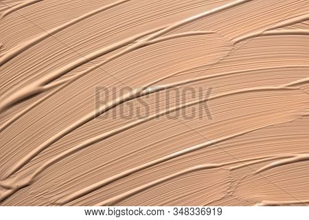 Abstract Background With Brush Strokes. Beige Facial Foundation Cream Close Up Texture. Nude Paint S